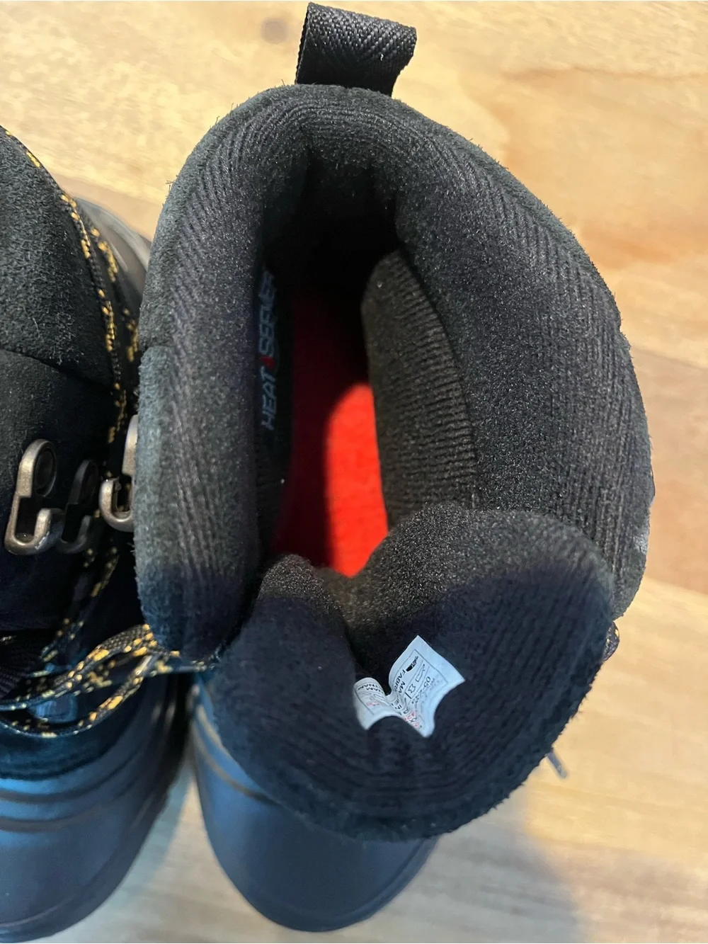 The North Face Black Boots with Yellow-Accent Laces